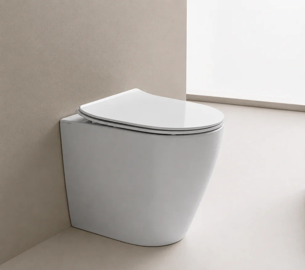 SCARABEO Set Sanitari MOON WC Rimless + Bidet a Terra Filo Parete con Coprivaso Incluso
